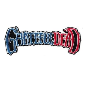 May include: Embroidered patch featuring the words "Grateful Dead" in a stylized font. The text is divided into two sections, with the left side in blue and the right side in red, both outlined in black and white.