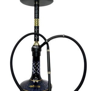 May include: A tall hookah featuring a dark blue glass base with a silver lattice pattern and the Nara logo. The stem is black with gold accents, topped by a round black tray and a light brown bowl. A long black hose with a spring is attached.
