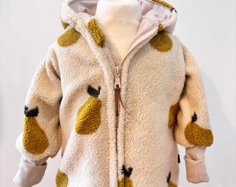 May include: A cream-colored, hooded jacket with a pear pattern. The jacket features a full zipper, ribbed cuffs, and a soft, textured fabric. The pears are yellow with black stems and leaves. The jacket is displayed on a mannequin.