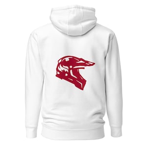 Peut inclure: Un sweat-shirt à capuche blanc arborant un motif rouge foncé représentant un casque de motocross centré au dos. Le vêtement comprend une capuche avec cordons de serrage, des manches longues à poignets côtelés et un ourlet côtelé.