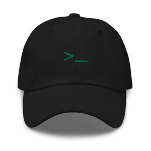 May include: A black baseball cap featuring an embroidered green command line prompt symbol consisting of a greater-than sign and an underscore on the front center. The cap has a curved brim and a structured crown with matching black eyelets.