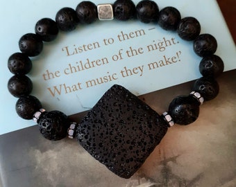 Children of the Night - elasticated rhinestone black lava bead bracelet.