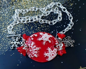 Snowflakes Falling  -  scarlet ceramic snowflake, flowers and snowflakes silver chain bracelet.