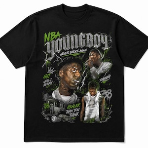 May include: A black short-sleeved t-shirt featuring a graphic print of the rapper NBA YoungBoy. The design includes the text NBA YOUNGBOY, NEVER BROKE AGAIN, 4KT UNTIL I RETURN, REALER THAN YOU THINK, and 38, along with images of the artist and lightning.