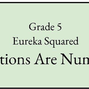 May include: A rectangular light green sign with black text that reads Grade 5, Eureka Squared, and Fractions Are Numbers. The text is centered and arranged in three distinct lines, with the final line appearing in a larger font size.