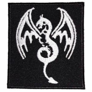 May include: White embroidered dragon patch on a black background. The dragon is stylized with wings spread and a curled tail.
