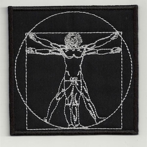 Könnte beinhalten: Ein schwarzer gestickter Aufnäher mit einer weißen Umrandung einer menschlichen Figur in einem Kreis und einem Quadrat. Die Figur befindet sich in der Vitruvianischen Mann-Pose, mit ausgestreckten Armen und Beinen.