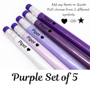 May include: A set of five purple pencils with the name "Piper" and a heart symbol printed on them. The pencils are in shades of purple, from white to dark purple, with purple erasers. The text "Purple Set of 5" is at the bottom.