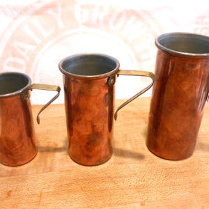 Three Copper Measuring Cups, Vintage