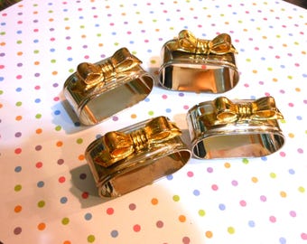 Four Audrey Silver Plated Oblong Rings with Gold Metal Bows