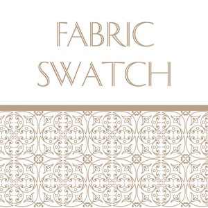 May include: A white fabric swatch with a brown patterned border. The text "FABRIC SWATCH" is printed in brown at the top of the swatch.