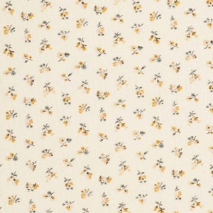 May include: A white fabric with a small, repeating pattern of yellow and green floral sprigs.