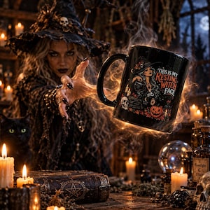 May include: A black ceramic mug featuring a graphic illustration of a witch, a skull, a pumpkin, and the text 'THIS IS MY RESTING WITCH FACE'. The mug is surrounded by swirling orange smoke and is presented in a dark, atmospheric setting with candles.