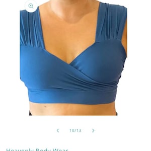 May include: A blue bamboo comfy bra with a criss-cross front and adjustable straps. The bra is made of a soft, breathable fabric and is perfect for everyday wear. Heavenly Body Wear. $38.00 USD. Tax included. heavenlybodywear.com