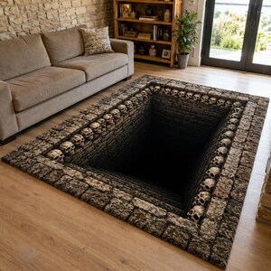 May include: A rectangular area rug featuring a 3D optical illusion of a deep, dark rectangular pit. The border of the rug is designed with a pattern of weathered stone bricks and human skulls, creating a realistic depth effect on the floor.