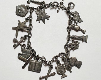 Older Sterling Silver Charm Bracelet with 17 Detailed Flat Charms, 7.5" Long, 18 Grams, Please Read Description