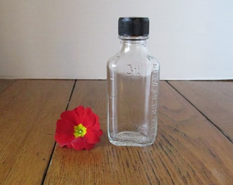 Vintage Small Glass Medicine Bottle with Black Cap  2 oz  Duraglas
