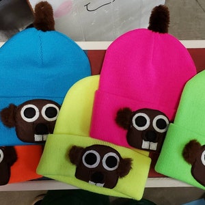 Groundhog knit hats with tail.