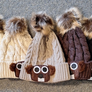 Knit pom beanie with felt and faux fur groundhog face