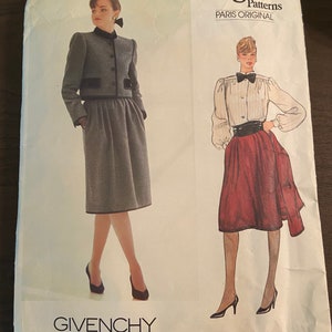 May include: Vintage Vogue Patterns Paris Original sewing pattern for a Givenchy suit. The pattern is for size 12 and includes a jacket and skirt. The pattern is in good condition and has never been used.