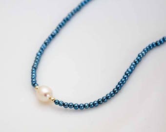 Blue hematite choker with high quality freshwater pearl.    Shown in 16 1/2 inches.  Choose your own length.