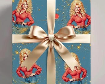 May include: A square gift box wrapped in blue paper featuring a repeating pattern of a blonde woman in a red long-sleeve shirt and blue jeans, accented with gold glitter stars. A wide, smooth, light beige satin ribbon is tied in a large bow.