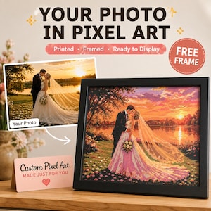 May include: A custom pixel art print of a wedding couple in a black frame. The text reads: YOUR PHOTO IN PIXEL ART, Printed, Framed, Ready to Display, FREE FRAME, Your Photo, and Custom Pixel Art MADE JUST FOR YOU with a small red heart icon.
