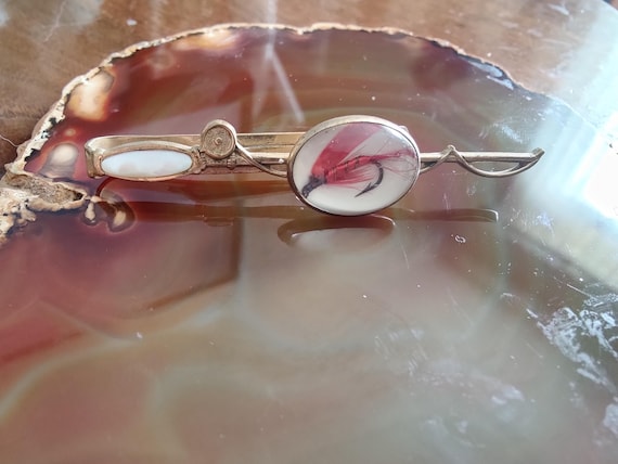 Fly-fishing lure gold tone tie bar with bubble glass