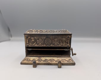 Ornate Eastlake bronze patinated metal cigarette dispenser box with griffons and peacock beautiful patterns