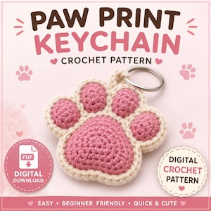 May include: A crochet paw print keychain pattern featuring a pink and cream yarn design. The text reads PAW PRINT KEYCHAIN CROCHET PATTERN, DIGITAL DOWNLOAD, and DIGITAL CROCHET PATTERN. The design includes a metal ring attached to the top.
