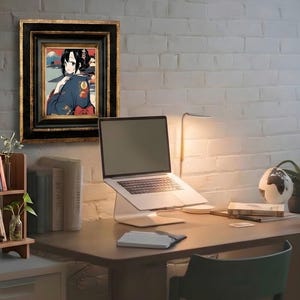 May include: A framed anime-style illustration of a dark-haired character in a blue kimono, displayed on a white brick wall above a wooden desk with a laptop on a stand, a small bookshelf, a globe, and a desk lamp in a home office setting.