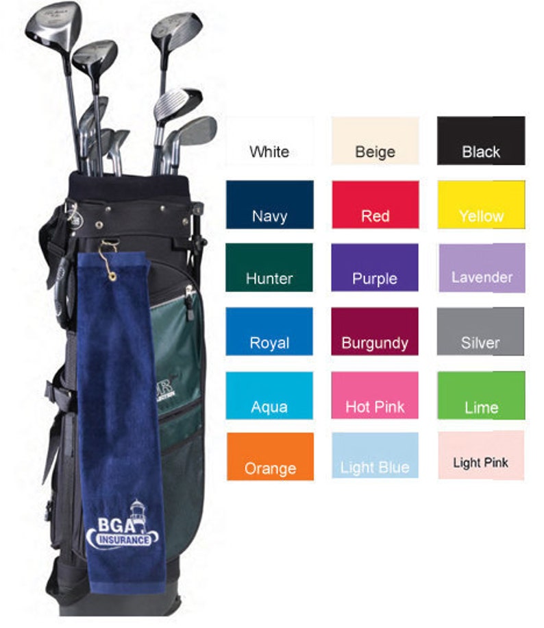 May include: A black golf bag with a green pocket and a blue towel hanging from the side. The towel has the text "BGA INSURANCE" and a lighthouse graphic. The bag is filled with golf clubs.