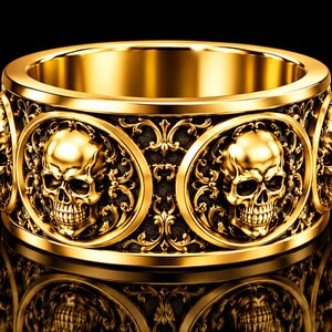 May include: A wide gold ring featuring a series of raised, three-dimensional skull motifs set within circular frames. The band is decorated with intricate, ornate scrollwork patterns against a dark, recessed background, creating a high-contrast look.