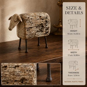 May include: A sheep figurine with a textured, weathered wood body and four dark metal legs. The figure stands 6.30 inches high, 6.69 inches wide, and 3.54 inches thick. The surface features a natural, porous finish with visible grain and small indentations.