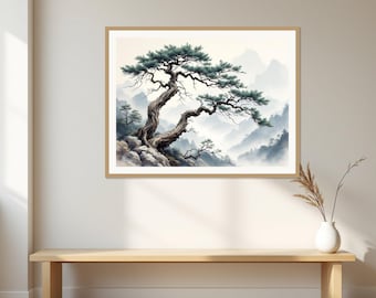 May include: A framed wall art print featuring a gnarled, dark-barked pine tree growing from rocky terrain. The background displays soft, misty mountain ranges in shades of blue, gray, and white, creating a serene landscape scene in a light wood frame.