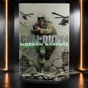 May include: A Call of Duty 4 Modern Warfare collectible statue featuring a soldier in olive green tactical gear, helmet, and goggles, holding a rifle. The soldier stands against a textured concrete wall with rubble and two black helicopters.