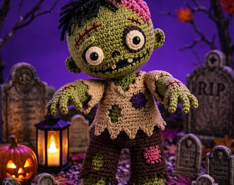 May include: A crocheted zombie doll with green skin, black and pink hair, and large white eyes. The doll wears a tattered beige shirt with purple and green patches, and brown pants with green and pink patches, featuring stitched scars on its head and arms.