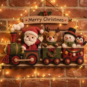 May include: A crocheted wall hanging featuring a train with Santa Claus, a reindeer, a snowman, and a penguin in the carriages. Above the train is a wooden sign with the text Merry Christmas. The train is decorated with festive colors.
