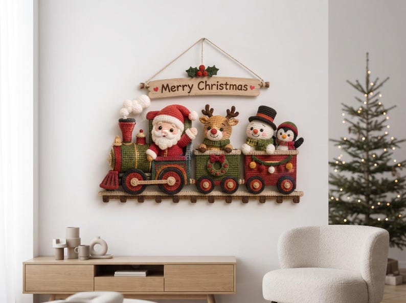 May include: A crocheted wall hanging featuring a train with Santa Claus, a reindeer, a snowman, and a penguin in the carriages. Above the train, a wooden sign reads Merry Christmas with holly accents. The train is red, green, and brown.