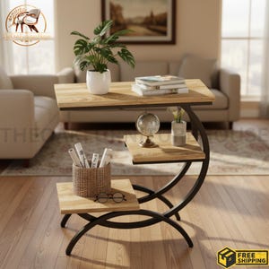 May include: A three-tiered side table with a black metal frame and light wood grain shelves. The top shelf holds a potted plant and books, the middle shelf holds a globe and a vase, and the bottom shelf holds a woven basket and glasses.