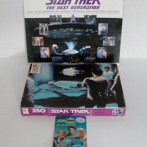 Collection of Star Trek Memorabilia that includes 12 posters 1979 Complete Puzzel and a 1993 Viewer