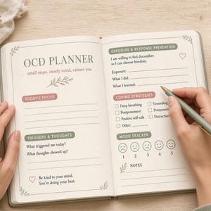 May include: An open OCD planner with cream-colored pages featuring sections for Today's Focus, Triggers & Thoughts, Exposure & Response Prevention, Coping Strategies, and a Mood Tracker. The text includes 'OCD PLANNER', 'small steps, steady mind, calmer you'.