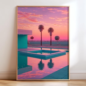 May include: A framed wall art print depicting a modern architectural scene with a turquoise swimming pool and hot tub. The landscape features tall palm trees against a vibrant sunset sky filled with pink, orange, and purple clouds at dusk.