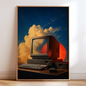 May include: A framed wall art print featuring a vintage desktop computer with a monitor, keyboard, and mouse set against a backdrop of a deep blue sky with large, golden-lit cumulus clouds and a large, vibrant red sun positioned behind the hardware.