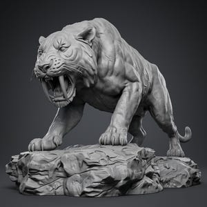 May include: A monochromatic grey figurine of a sabre-toothed tiger in a prowling stance with its mouth open, revealing long, sharp fangs. The creature is depicted with detailed muscular anatomy and fur texture, standing atop a jagged rock base.