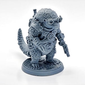 May include: A gray resin figurine of a pangolin creature wearing goggles and mechanical gear armor. The figure features intricate clockwork details, including gears on the chest and limbs, and stands on a circular base decorated with gear motifs.