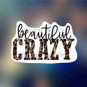 May include: A white sticker with black text that reads "beautiful crazy" with a leopard print pattern behind the text.