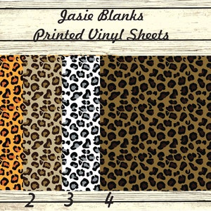 May include: Four sheets of printed vinyl with a leopard print pattern. The sheets are numbered 1 through 4. The patterns are orange and black, brown and black, gray and white, and brown and black.