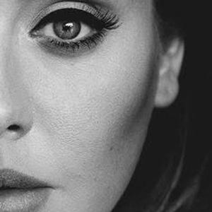 May include: A black and white portrait featuring a close-up of a face with defined eyebrows, dark winged eyeliner, and long eyelashes. The lighting highlights the texture of the skin, the iris of the eye, and the contours of the nose and lips.