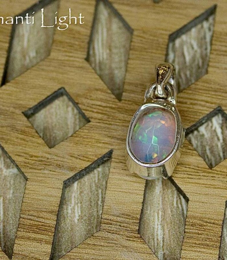 Ethiopian opal gemstone silver pendant